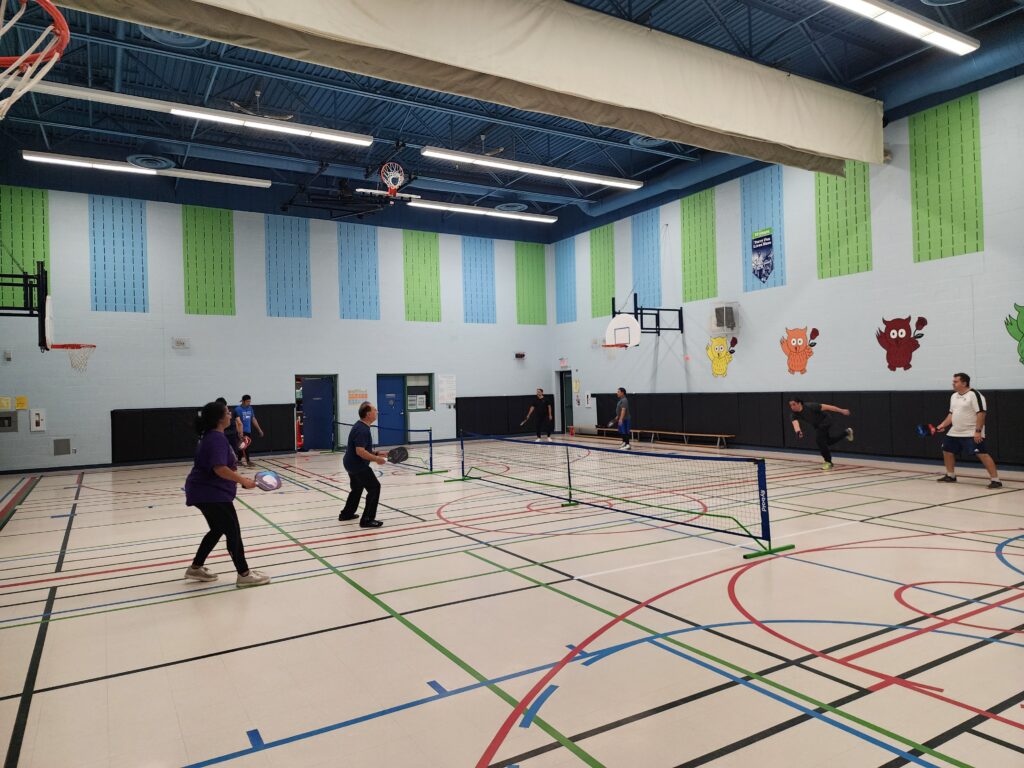 Adults playing pickleball at Play Pickleball Club in Mississauga